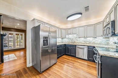 Located in the coveted Wedgewood Golf Community, 6705 Player on Wedgewood Golfers Club in Mississippi - for sale on GolfHomes.com, golf home, golf lot