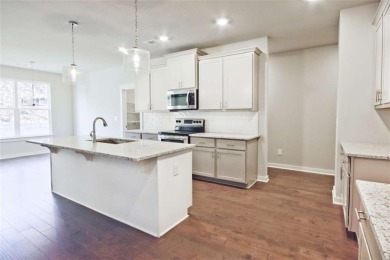 Welcome to 4063 Links Blvd - Built with Heart, Not Just a on Traditions of Braselton Golf Club in Georgia - for sale on GolfHomes.com, golf home, golf lot