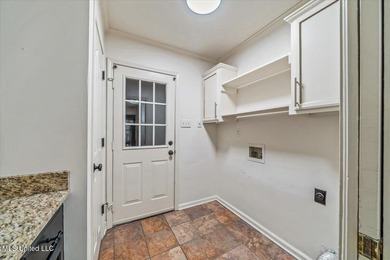 Located in the coveted Wedgewood Golf Community, 6705 Player on Wedgewood Golfers Club in Mississippi - for sale on GolfHomes.com, golf home, golf lot