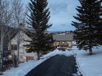 This stunning residence offers a grand sense of entry with its on Club At Cordillera Short Course in Colorado - for sale on GolfHomes.com, golf home, golf lot