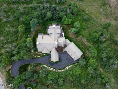 This stunning residence offers a grand sense of entry with its on Club At Cordillera Short Course in Colorado - for sale on GolfHomes.com, golf home, golf lot