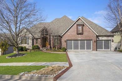 Welcome to 6211 South Riverbend Road, a stunning custom-built on Rivercut Golf Course in Missouri - for sale on GolfHomes.com, golf home, golf lot