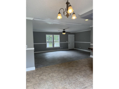 Recently moved to this lot, this beautifully 2015 manufactured on Wildwood Country Club in Florida - for sale on GolfHomes.com, golf home, golf lot