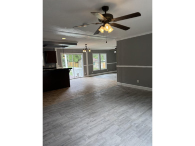Recently moved to this lot, this beautifully 2015 manufactured on Wildwood Country Club in Florida - for sale on GolfHomes.com, golf home, golf lot