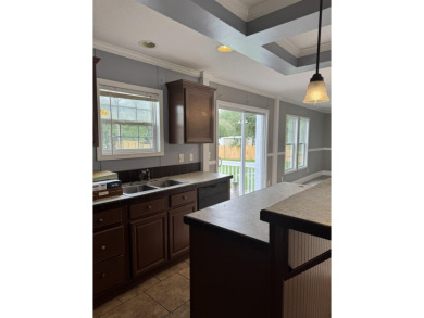 Recently moved to this lot, this beautifully 2015 manufactured on Wildwood Country Club in Florida - for sale on GolfHomes.com, golf home, golf lot