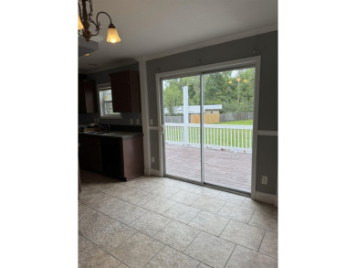 Recently moved to this lot, this beautifully 2015 manufactured on Wildwood Country Club in Florida - for sale on GolfHomes.com, golf home, golf lot