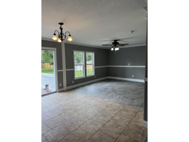 Recently moved to this lot, this beautifully 2015 manufactured on Wildwood Country Club in Florida - for sale on GolfHomes.com, golf home, golf lot