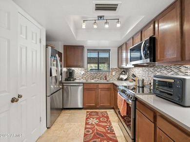 Pride of ownership is evident in this updated 2 bedroom 2 bath on Arizona Golf Resort and Conference Center in Arizona - for sale on GolfHomes.com, golf home, golf lot