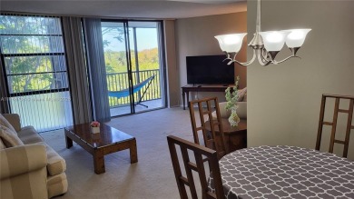 Enjoy the wrap-around screened balcony with amazing Marina and on Turnberry Isle Resort and Club in Florida - for sale on GolfHomes.com, golf home, golf lot