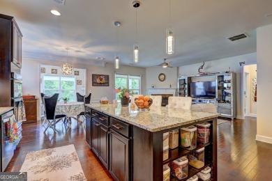 Welcome to easy living in Sun City Peachtree, a vibrant 55+ on Canongate Golf At Sun City Peachtree in Georgia - for sale on GolfHomes.com, golf home, golf lot