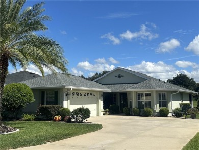 Welcome to this beautiful 3-bedroom, 2-bath, 2-car garage rare on Summerglen Country Club in Florida - for sale on GolfHomes.com, golf home, golf lot