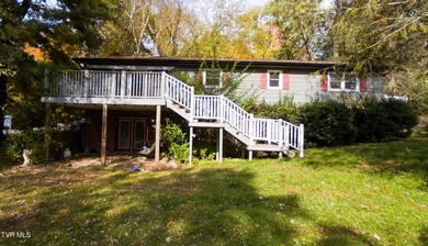 This spacious 4-bedroom, 3-bath home offers incredible potential on Country Club of Bristol in Tennessee - for sale on GolfHomes.com, golf home, golf lot