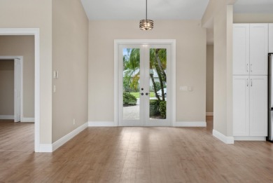 Exceptional FULLY renovated 3BR/2.5BA lakefront home in the on The Legacy Golf and Tennis Club in Florida - for sale on GolfHomes.com, golf home, golf lot
