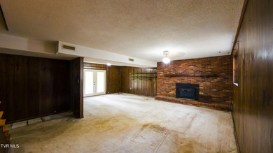This spacious 4-bedroom, 3-bath home offers incredible potential on Country Club of Bristol in Tennessee - for sale on GolfHomes.com, golf home, golf lot
