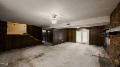 This spacious 4-bedroom, 3-bath home offers incredible potential on Country Club of Bristol in Tennessee - for sale on GolfHomes.com, golf home, golf lot