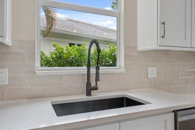 Exceptional FULLY renovated 3BR/2.5BA lakefront home in the on The Legacy Golf and Tennis Club in Florida - for sale on GolfHomes.com, golf home, golf lot
