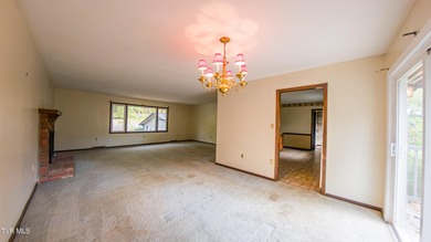 This spacious 4-bedroom, 3-bath home offers incredible potential on Country Club of Bristol in Tennessee - for sale on GolfHomes.com, golf home, golf lot