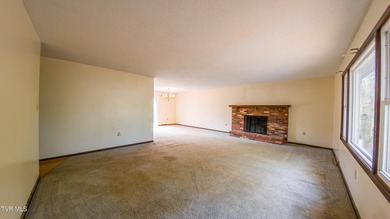 This spacious 4-bedroom, 3-bath home offers incredible potential on Country Club of Bristol in Tennessee - for sale on GolfHomes.com, golf home, golf lot