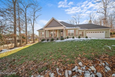 Nestled in the prestigious community of Tellico Village on a on Toqua Golf Course - Loudon County in Tennessee - for sale on GolfHomes.com, golf home, golf lot