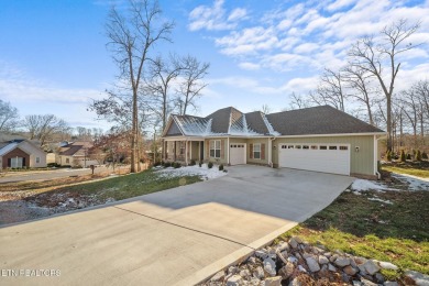 Nestled in the prestigious community of Tellico Village on a on Toqua Golf Course - Loudon County in Tennessee - for sale on GolfHomes.com, golf home, golf lot