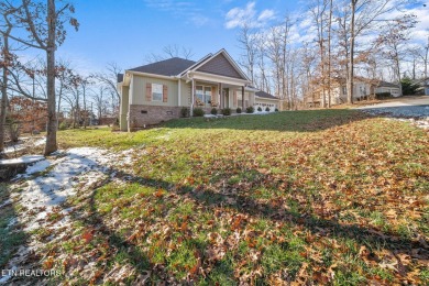 Nestled in the prestigious community of Tellico Village on a on Toqua Golf Course - Loudon County in Tennessee - for sale on GolfHomes.com, golf home, golf lot