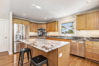 Gorgeous, custom-quality condo on a beautiful pond in popular on Watermark Country Club in Michigan - for sale on GolfHomes.com, golf home, golf lot