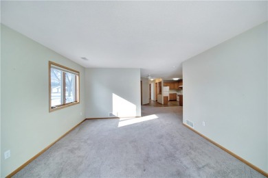 This 2 bed, 2 bath condo with one level living is located right on The Amery Golf Club in Wisconsin - for sale on GolfHomes.com, golf home, golf lot