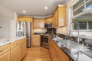 Gorgeous, custom-quality condo on a beautiful pond in popular on Watermark Country Club in Michigan - for sale on GolfHomes.com, golf home, golf lot