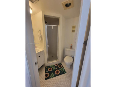 From the moment you open the door, you have an amazing lake view on Pine Island Ridge Country Club in Florida - for sale on GolfHomes.com, golf home, golf lot