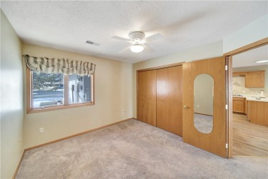 This 2 bed, 2 bath condo with one level living is located right on The Amery Golf Club in Wisconsin - for sale on GolfHomes.com, golf home, golf lot