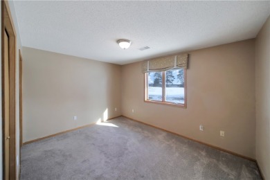 This 2 bed, 2 bath condo with one level living is located right on The Amery Golf Club in Wisconsin - for sale on GolfHomes.com, golf home, golf lot