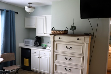 FIRST FLOOR END UNIT! Well maintained, bright and nicely on Brunswick Plantation and Golf Resorts in North Carolina - for sale on GolfHomes.com, golf home, golf lot