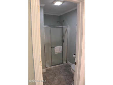 FIRST FLOOR END UNIT! Well maintained, bright and nicely on Brunswick Plantation and Golf Resorts in North Carolina - for sale on GolfHomes.com, golf home, golf lot