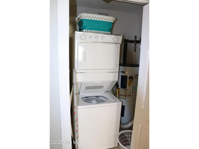 FIRST FLOOR END UNIT! Well maintained, bright and nicely on Brunswick Plantation and Golf Resorts in North Carolina - for sale on GolfHomes.com, golf home, golf lot