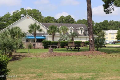FIRST FLOOR END UNIT! Well maintained, bright and nicely on Brunswick Plantation and Golf Resorts in North Carolina - for sale on GolfHomes.com, golf home, golf lot