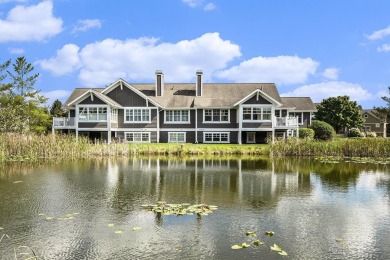 Gorgeous, custom-quality condo on a beautiful pond in popular on Watermark Country Club in Michigan - for sale on GolfHomes.com, golf home, golf lot
