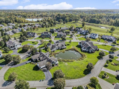 Gorgeous, custom-quality condo on a beautiful pond in popular on Watermark Country Club in Michigan - for sale on GolfHomes.com, golf home, golf lot