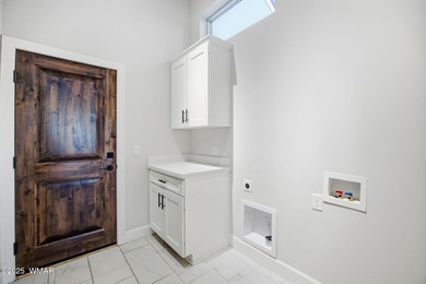 Stunning 2020 single-level home on the Bison Golf Course in the on Bison Golf and Country Club in Arizona - for sale on GolfHomes.com, golf home, golf lot