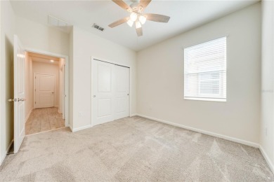 Located in the 55+ gated community of The Lakes at Harmony, this on Harmony Golf Preserve in Florida - for sale on GolfHomes.com, golf home, golf lot