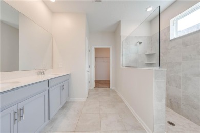 Located in the 55+ gated community of The Lakes at Harmony, this on Harmony Golf Preserve in Florida - for sale on GolfHomes.com, golf home, golf lot