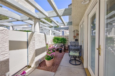 Welcome home to this beautifully upgraded 3-bedroom condo in the on Canyon Gate Country Club in Nevada - for sale on GolfHomes.com, golf home, golf lot