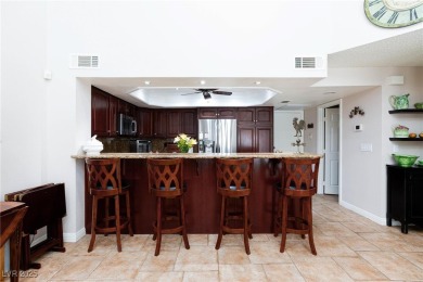 Welcome home to this beautifully upgraded 3-bedroom condo in the on Canyon Gate Country Club in Nevada - for sale on GolfHomes.com, golf home, golf lot