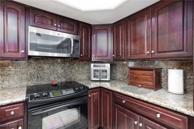Welcome home to this beautifully upgraded 3-bedroom condo in the on Canyon Gate Country Club in Nevada - for sale on GolfHomes.com, golf home, golf lot