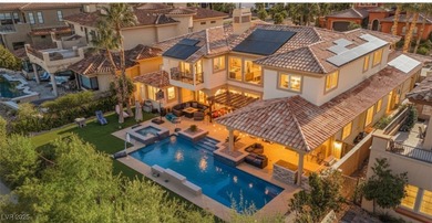 Experience resort-style living in this semi-custom 5 bedroom, 5 on South Shore At Lake Las Vegas in Nevada - for sale on GolfHomes.com, golf home, golf lot