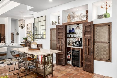 Welcome to tranquility. Step into your stunning custom home in on Troon Country Club in Arizona - for sale on GolfHomes.com, golf home, golf lot