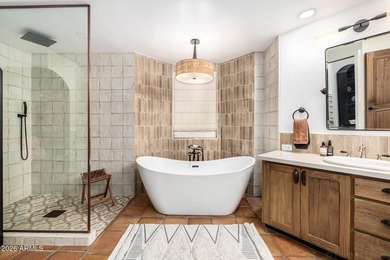 Welcome to tranquility. Step into your stunning custom home in on Troon Country Club in Arizona - for sale on GolfHomes.com, golf home, golf lot