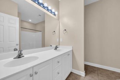Nestled in the exclusive gated community of Tidewater, this on Tidewater Golf Club and Plantation in South Carolina - for sale on GolfHomes.com, golf home, golf lot