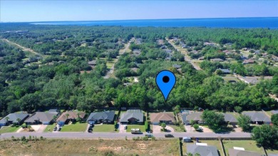 All brick exterior home with circular driveway and privacy on The Club At Hidden Creek in Florida - for sale on GolfHomes.com, golf home, golf lot