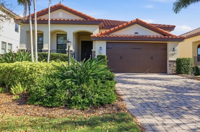 Located in the sought after gated waterfront community of on IMG Academies Golf and Country Club in Florida - for sale on GolfHomes.com, golf home, golf lot