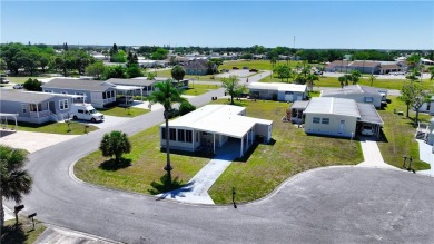 2 bed/2 bath in a cul-de-sac, long driveway w/space for vehicles on Barefoot Bay Golf Course in Florida - for sale on GolfHomes.com, golf home, golf lot